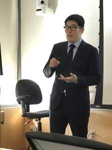 Youngee speaking during his defense